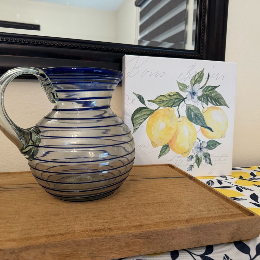 Beautiful Mexican hand blown pitcher.